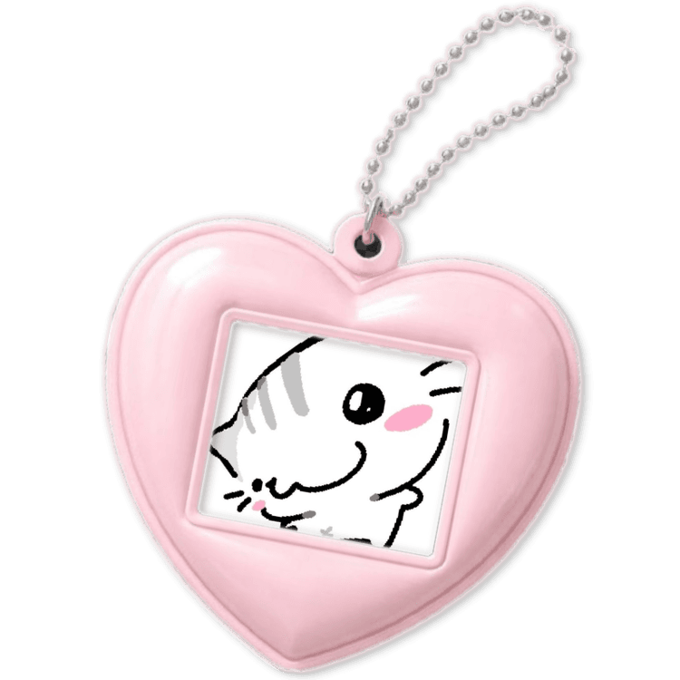 Pink heart charm with a cat illustration